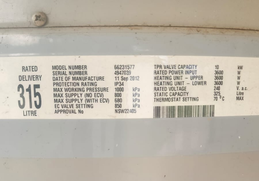 A clear, legible photo of the Compliance Plate on your current system